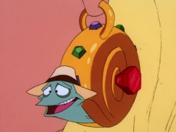 Speedy the Snail, with his new golden shell, gets used as an earring.