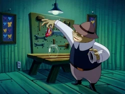 The jeweler prepares to put the butterfly into his collection.