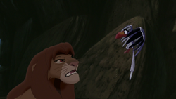 Zazu warns Simba of the Outsiders' attack.