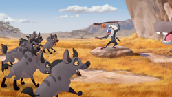 Chungu and his fellow hyenas advance on Rafiki.