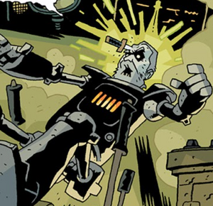 The reanimated robotic corpse of Gustave Eiffel is struck in the head by Number Two's knife.