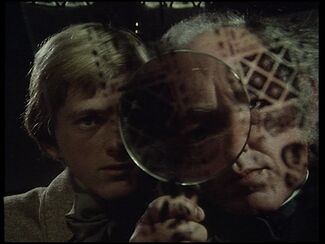 Paul Lavers and Michael Bryant in a screenshot from the 1974 BBC television adaptation of "The Treasure of Abbot Thomas".