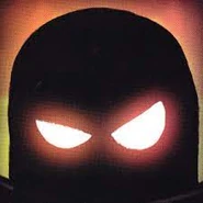 The Collector in The Wilderness' polaroid icon. He's depicted in silhouette for the sake of making him look more menacing.