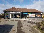 The building as a Burger King, Greggs and Subway
