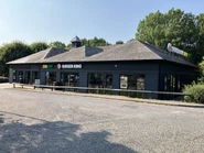 The building as a Burger King and Subway