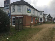 The building as a Greggs and Subway