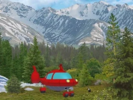 Rocket with the forests and the mountains in the background
