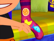 Leo showing his team his socks