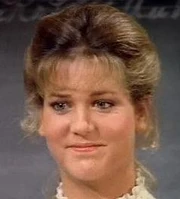 Leslie Landon as Etta Plum.
