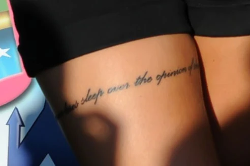 On her right thigh are the words “A tiger never loses sleep over the opinions of sheep”