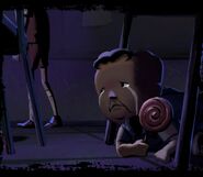 The Fat Kid hiding from a Bully under a desk.