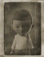 Фотография темнокожего мальчика.