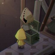 Scarecrow Mask as a jack-in-the-box in Very Little Nightmares.
