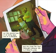 Myra holds a picture of Hush and her family.