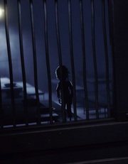 BoyBehindBars.png