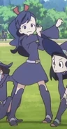 Mary stretching for the broom relay event in episode 3