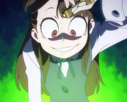 Akko uses mending magic powder during the exam.