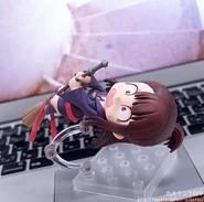 Akko failing to ride her broom.