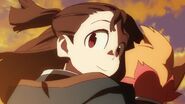 Akko exchanges gaze with Andrew as she and Amanda leave LWA 17