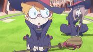 Lotte and Sucy see Akko excitedly pacing back and forth by the prospect of her would be first broom flight LWA 03