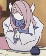 Sucy doing the Dwi Pada Sirsasana pose