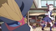 Akko notices Ursula entering her dorm room LWA 03