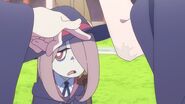 Akko shows her elbow scar to Sucy