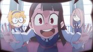 Akko notices the picture of Chariot's team winning Luna Nova Cup LWA 03