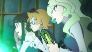 Diana assists Akko in properly reciting Pappiliodya Spell LWA 02