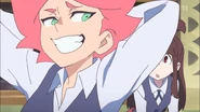 Amanda smiling at Akko while proposing that they ought to search Appleton Academy for its Holy Grail