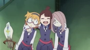 Akko and her friends in Ursula's room.