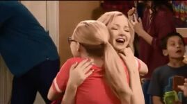 Liv and Maddie hugging