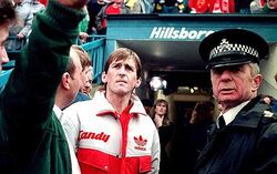 Kenny Dalglish being told about the disaster for the first time.