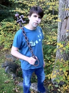 Joe Hill holding a life-size replica of the Chain Key.