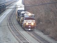 An NS intermodal roars East past Rose Yard, Altoona, PA