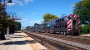 Passengers near an inbound train at 