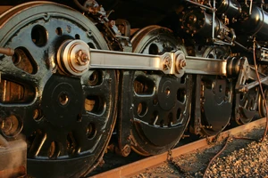 Hinged side rods connecting the  of a  locomotive.