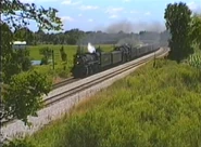 587 and Nickel Plate 765 highballs to Chicago.