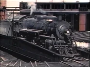 ATSF steam locomotive #4001 is going for a spin on a turntable.