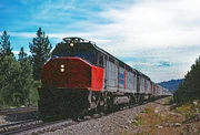 An Amtrak  with the  in 1975. By the mid-1970s Amtrak equipment was acquiring its own identity.