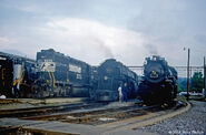 No. 587 with N&W No. 1218, and Norfolk Southern No. 3310.