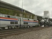 Amtrak #119 and #120 is passing the SP #4449 in Tacoma, WA in 2000.