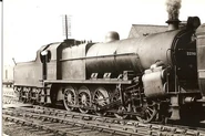 Big Bertha behind a Railway's Post Van
