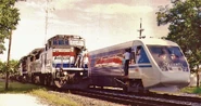 AmtrakX2000MeetsAmtrakPepsiCanDiesel.jpg (177 KB)
