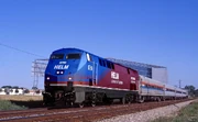 A P42DC being painted in the fictional "HELM ex HLCX" paint scheme.