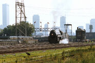 No. 611 passing Noble Street Tower in Chicago on August 6, 1983.