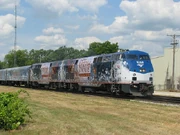 Two P42DC units dressed for Disney's "The Christmas Carol" train tour.