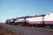 In 1975 The Union Pacific 8444 is doubleheading with the Southern Pacific 4449 while wearing the American Freedom Train paint scheme.