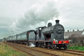 Cpf 9293-rpsi-no-131-passes-the-site-of-eden-halt-with-the-second-trial-train-between-whitehead-and-belfast-central-on-sunday-19-november-2017-photo-by-charles-p-friel