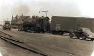No. 15 leaves a siding with a Boxcar.